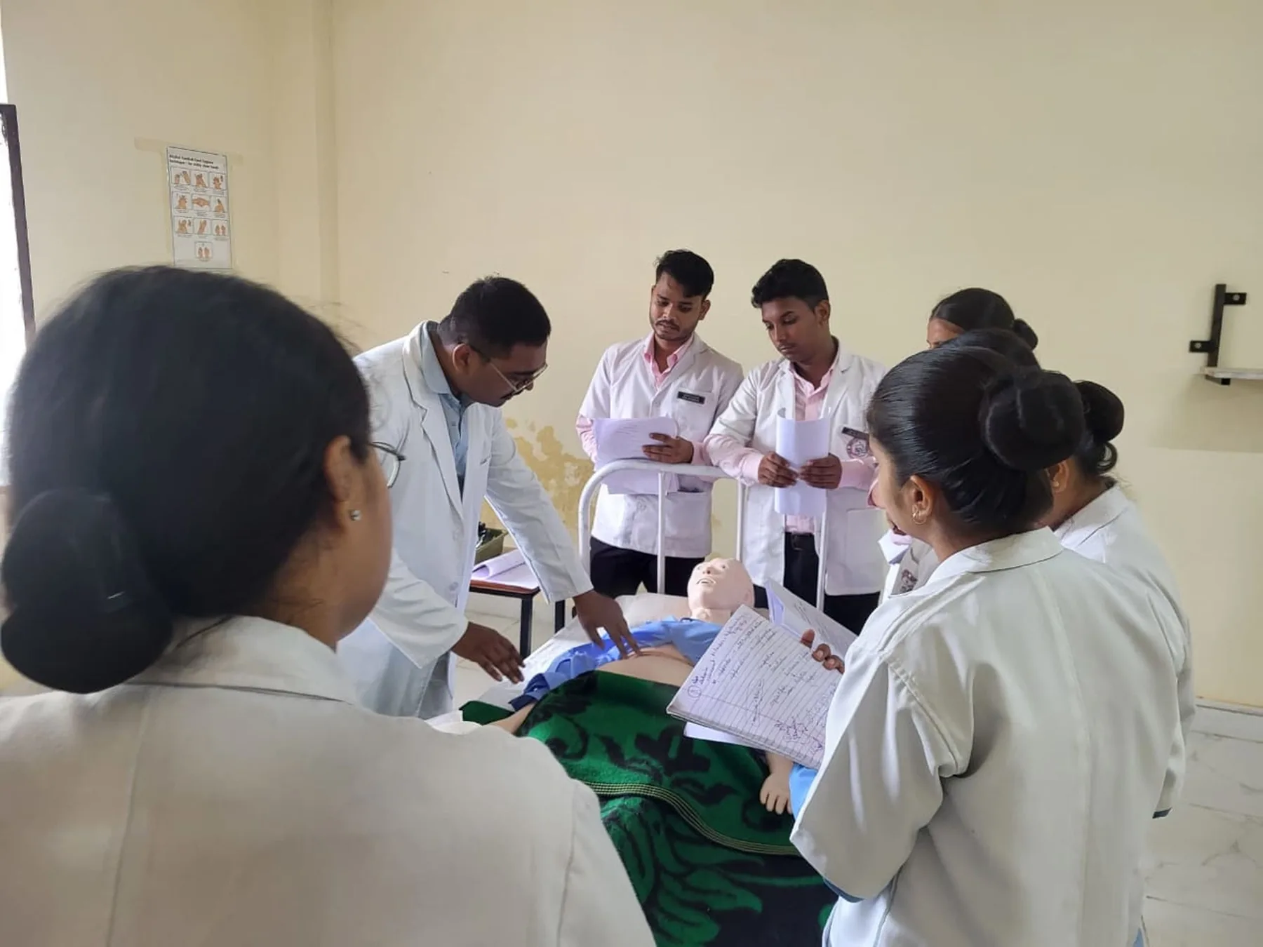 Indian students and faculty in a practical classroom training session